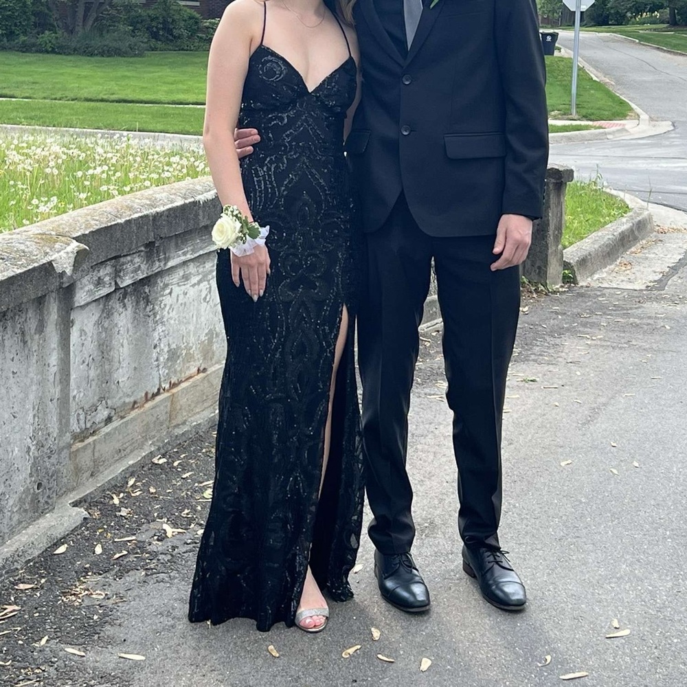Woman’s black prom dress